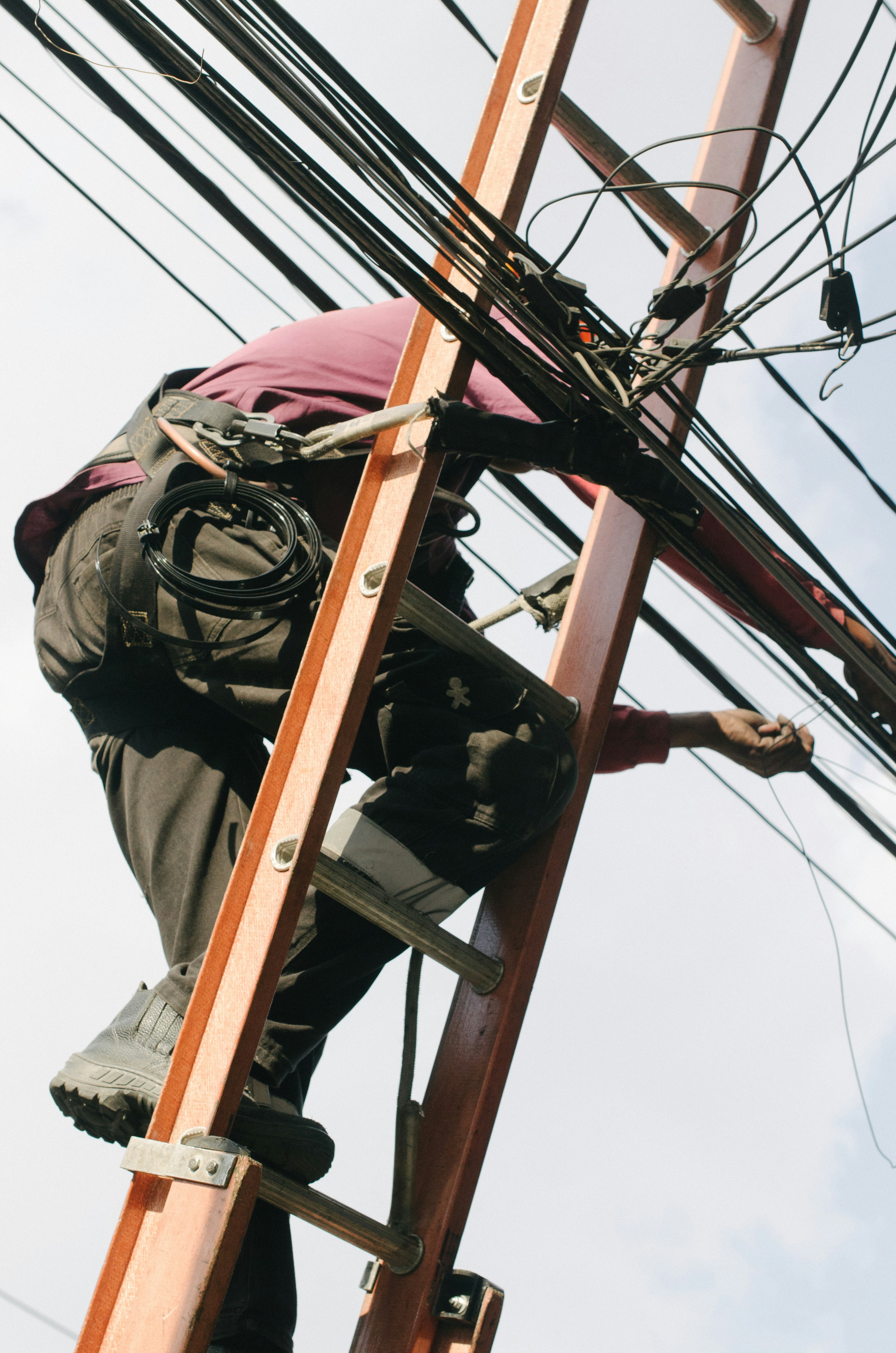 Electrician working on commercial panel installation